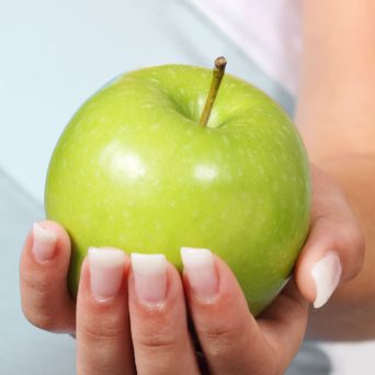 holding an apple