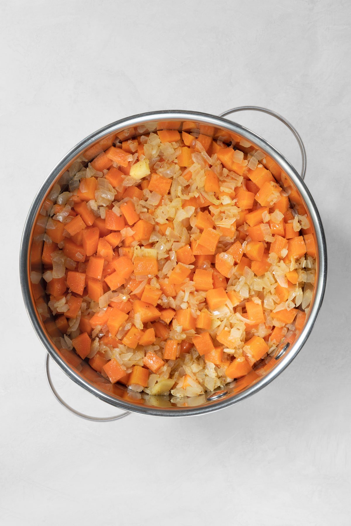 sautéing vegetables - onions, garlic, and carrots